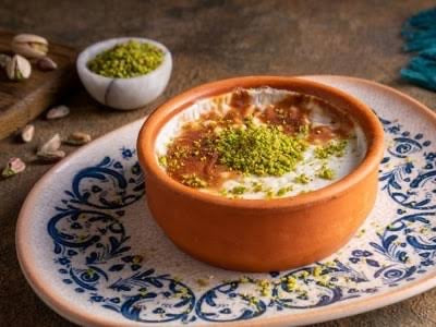 Captivating image of Lebanese Rice Pudding: A velvety delight by Filo Dessert Co, featuring fragrant Lebanese rice, enticing spices, and a touch of sweetness. An exquisite taste of authentic Lebanese culinary tradition.